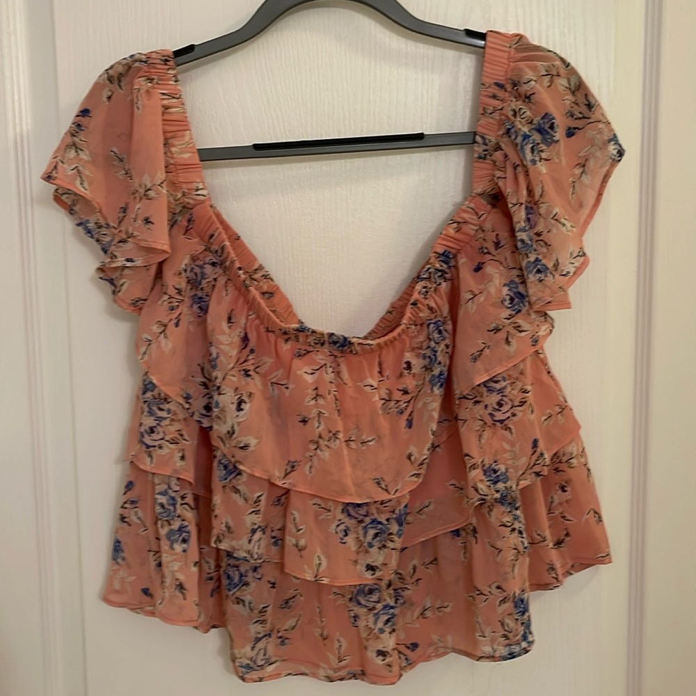 Off the shoulder shirt.
